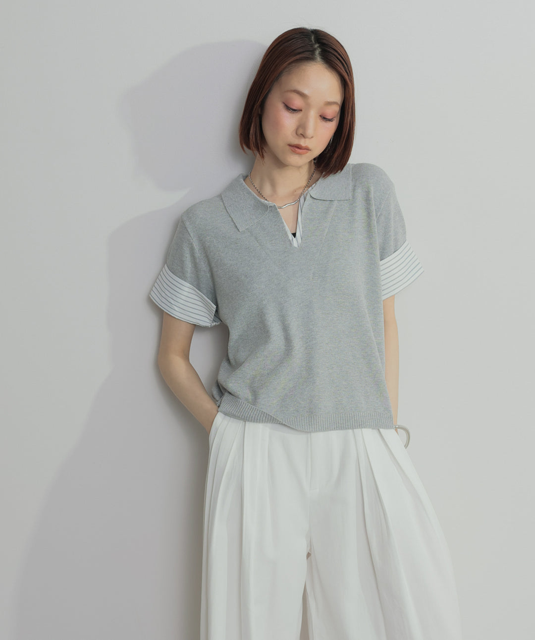 レイヤードポロニットトップス