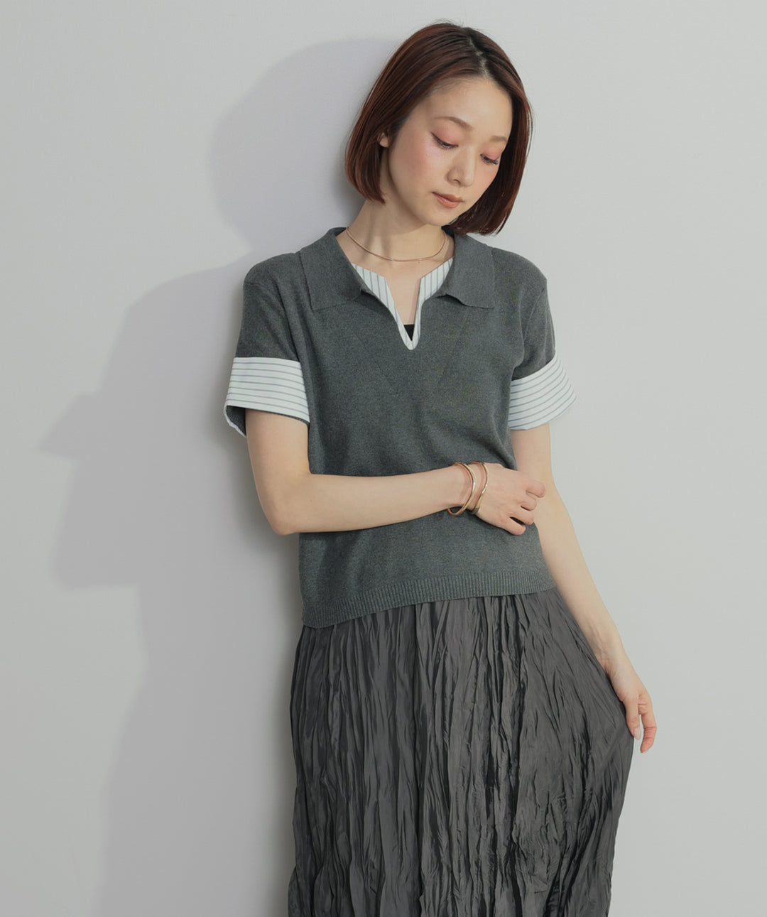 レイヤードポロニットトップス
