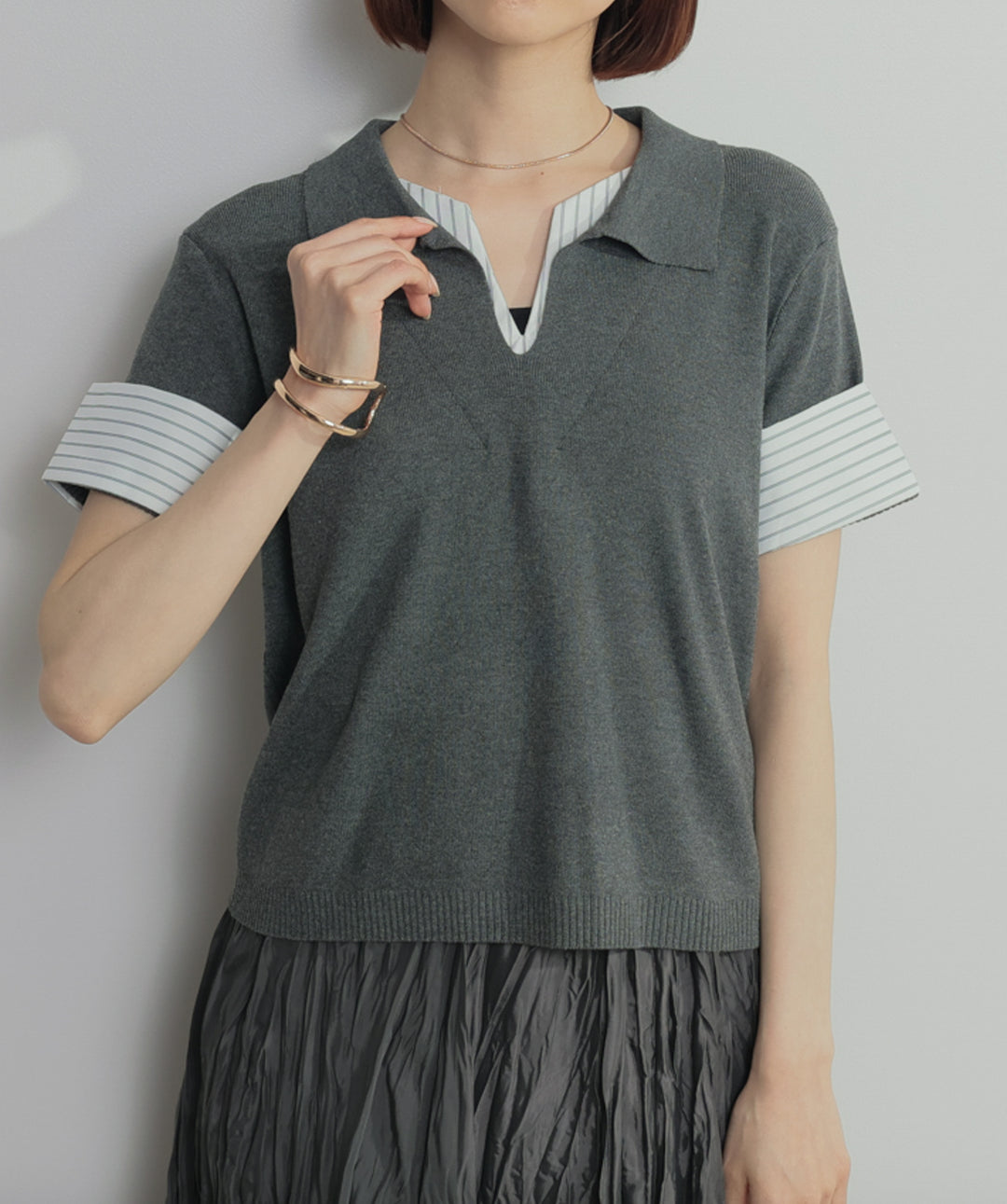 レイヤードポロニットトップス
