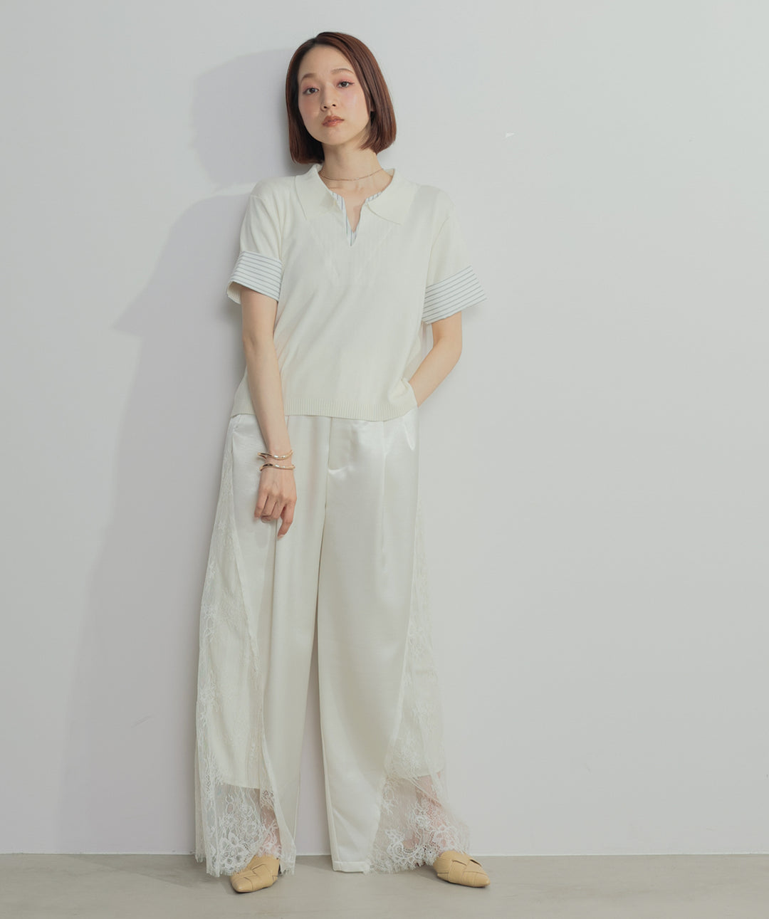 レイヤードポロニットトップス