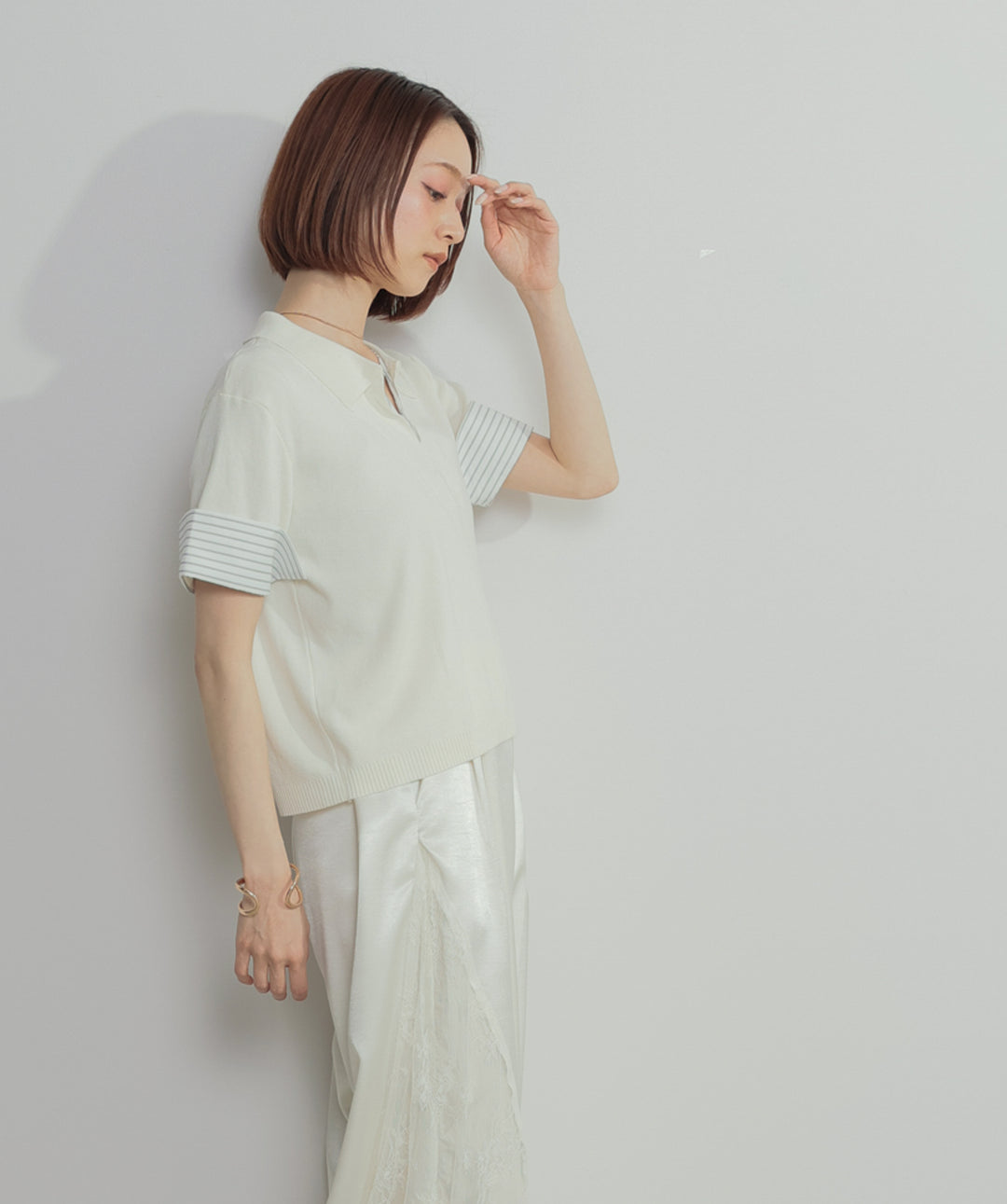 レイヤードポロニットトップス