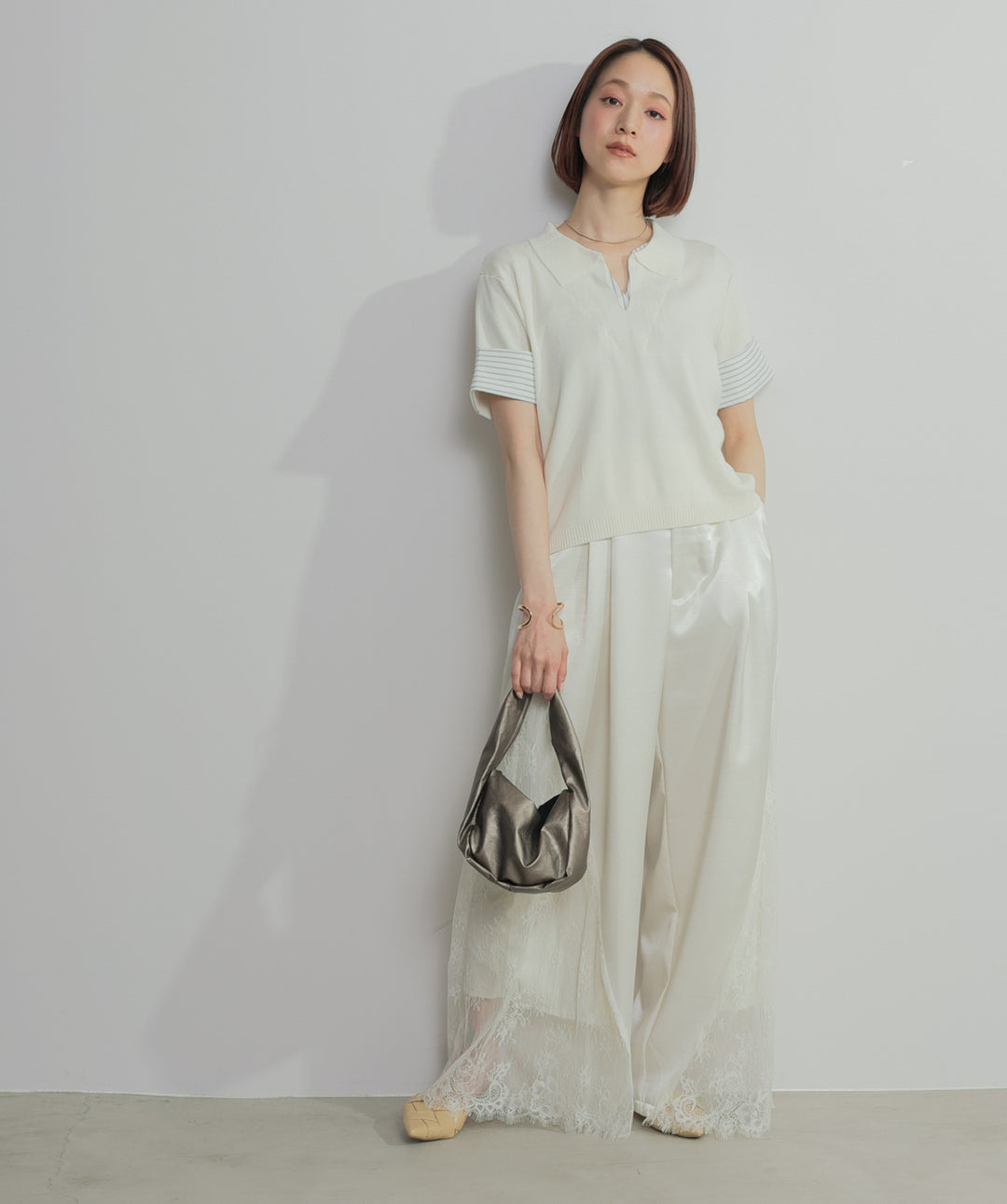 レイヤードポロニットトップス