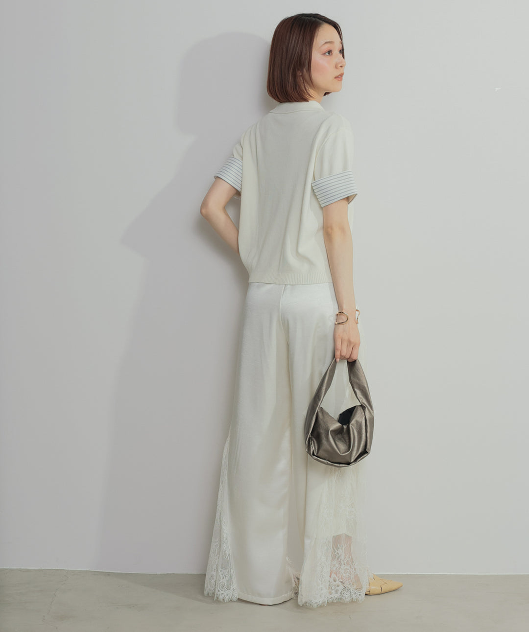 レイヤードポロニットトップス