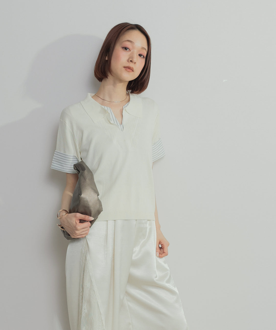 レイヤードポロニットトップス
