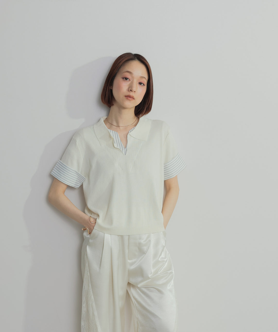レイヤードポロニットトップス