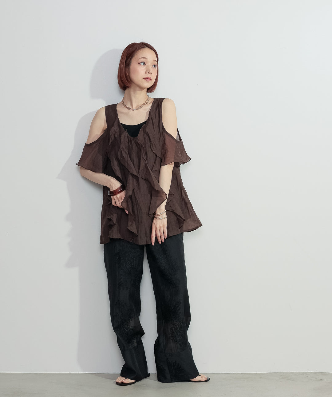 ラッフルオープンショルダーブラウス