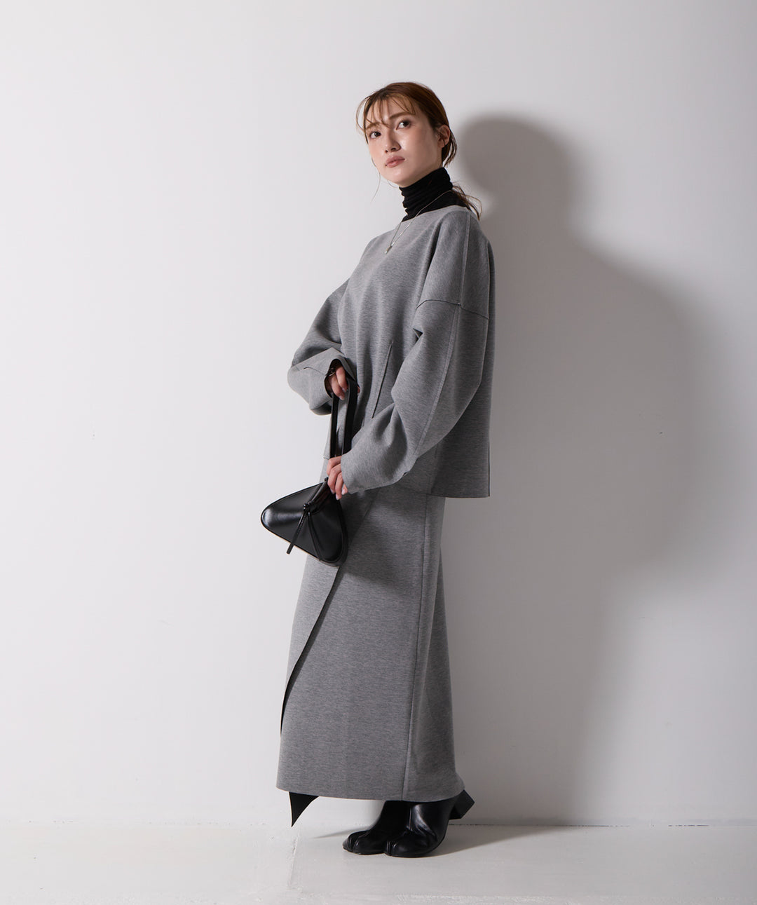 アシンメトリーヘムスカートドッキングセットアップ