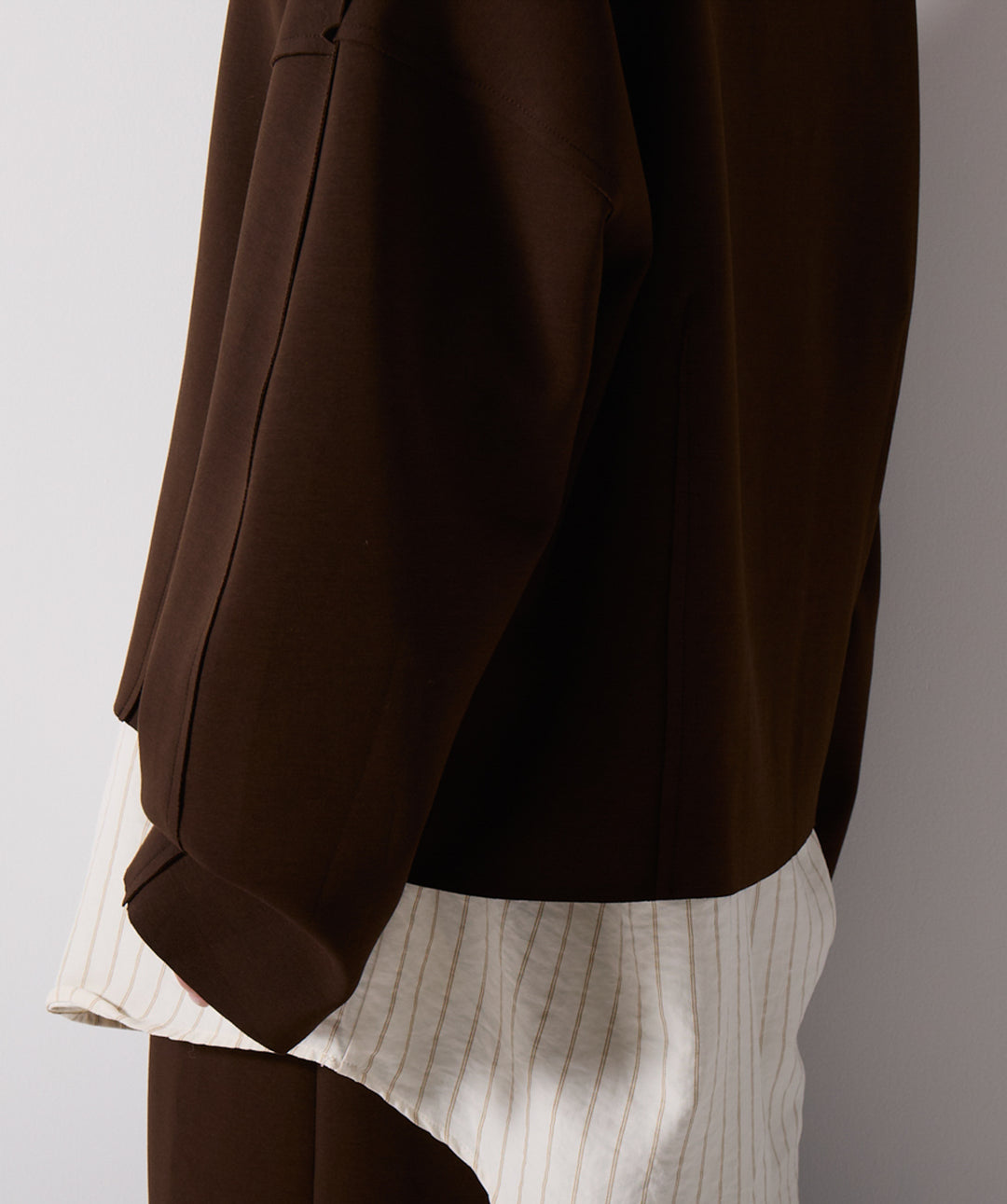 アシンメトリーヘムスカートドッキングセットアップ