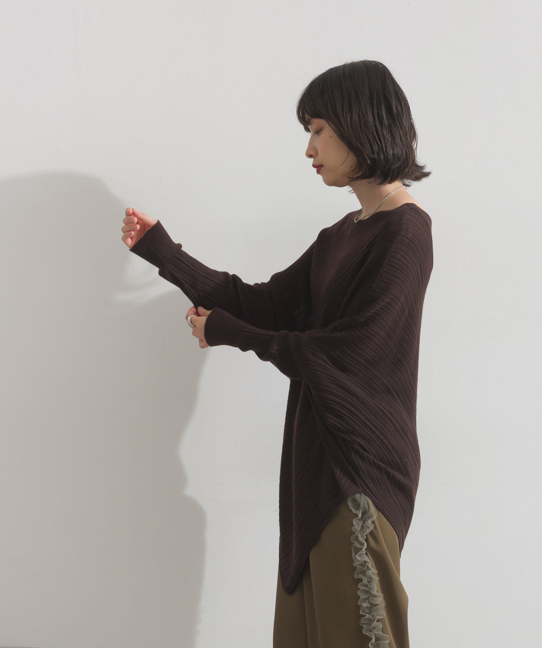 アシンメトリーヘムドルマンプルオーバー