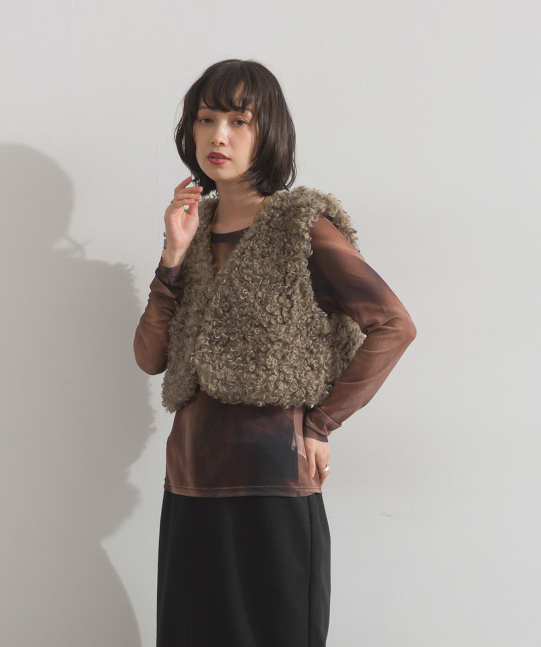 グラデーションシアーロングスリーブトップス