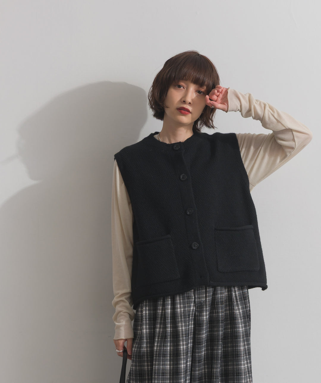 前開きボタンニットベスト