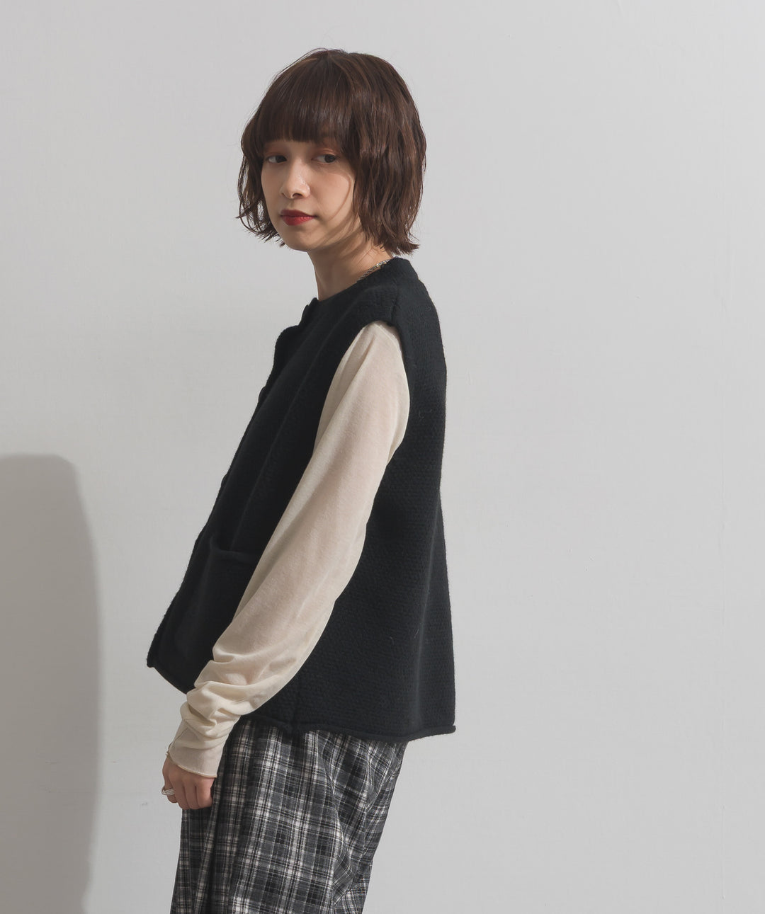 前開きボタンニットベスト