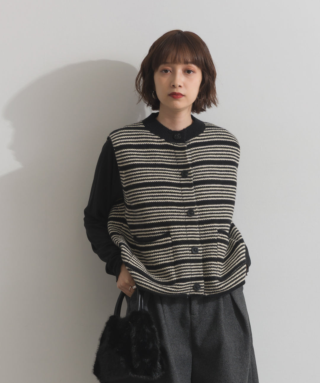 前開きボタンニットベスト