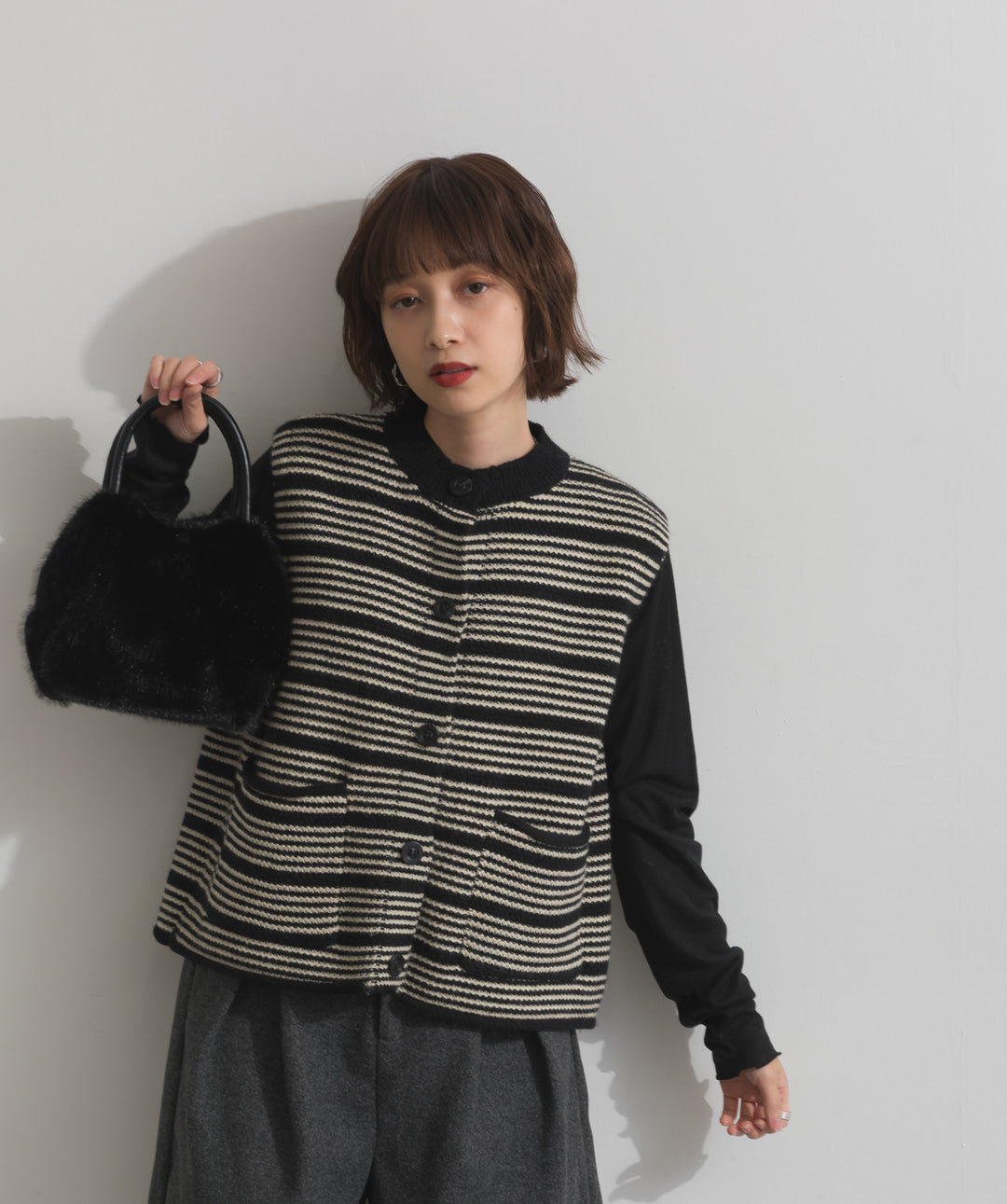 前開きボタンニットベスト