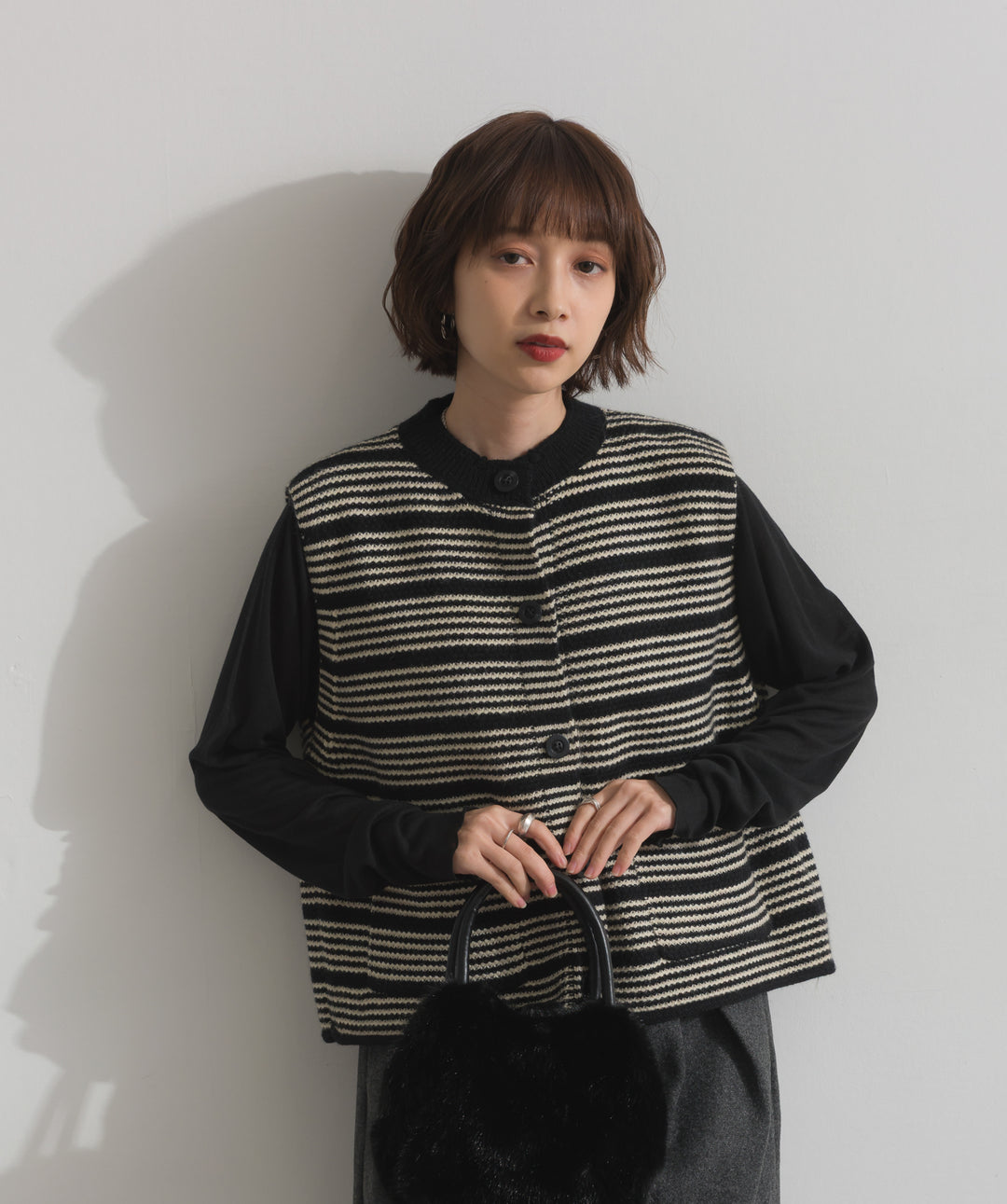 前開きボタンニットベスト