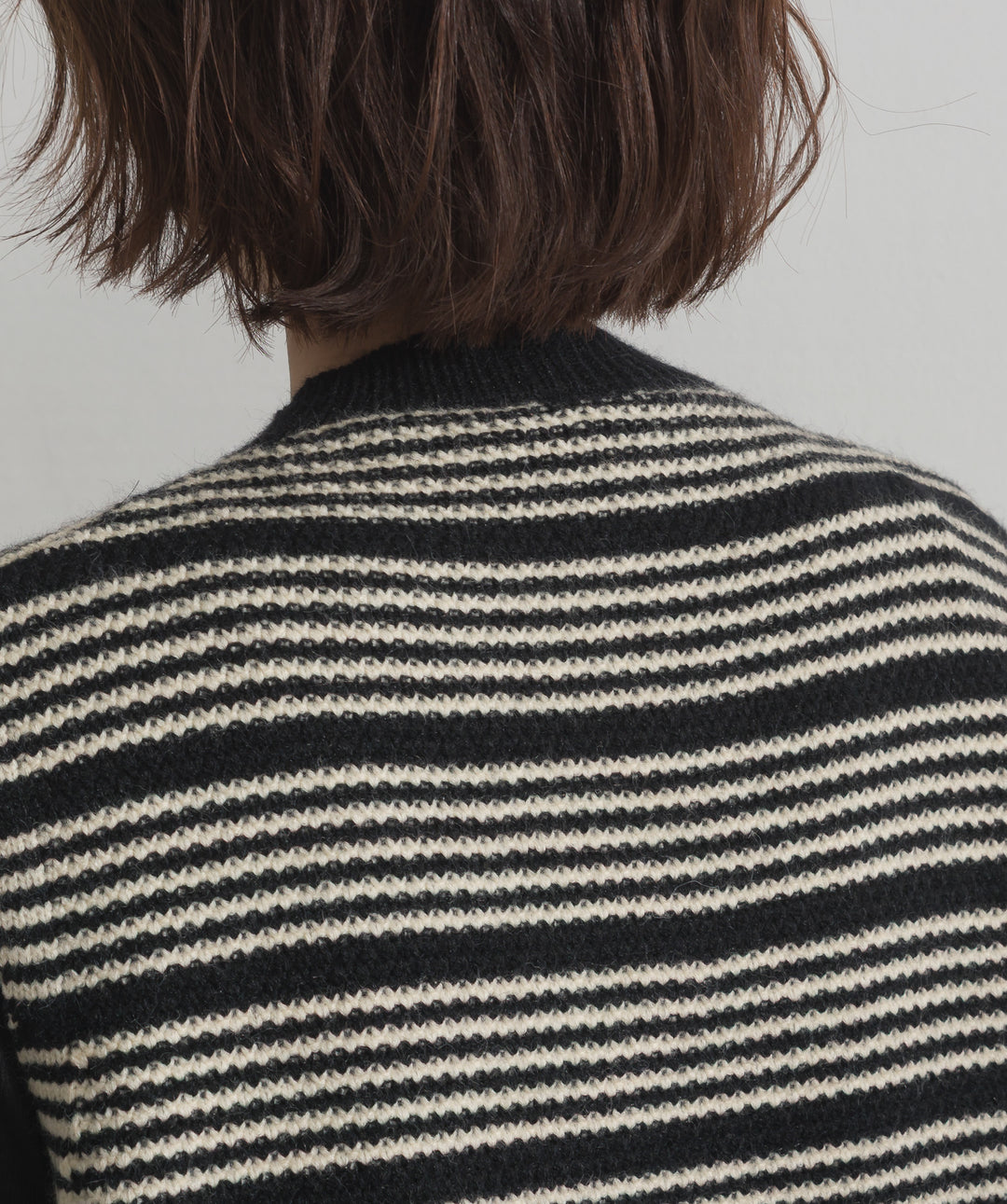 前開きボタンニットベスト