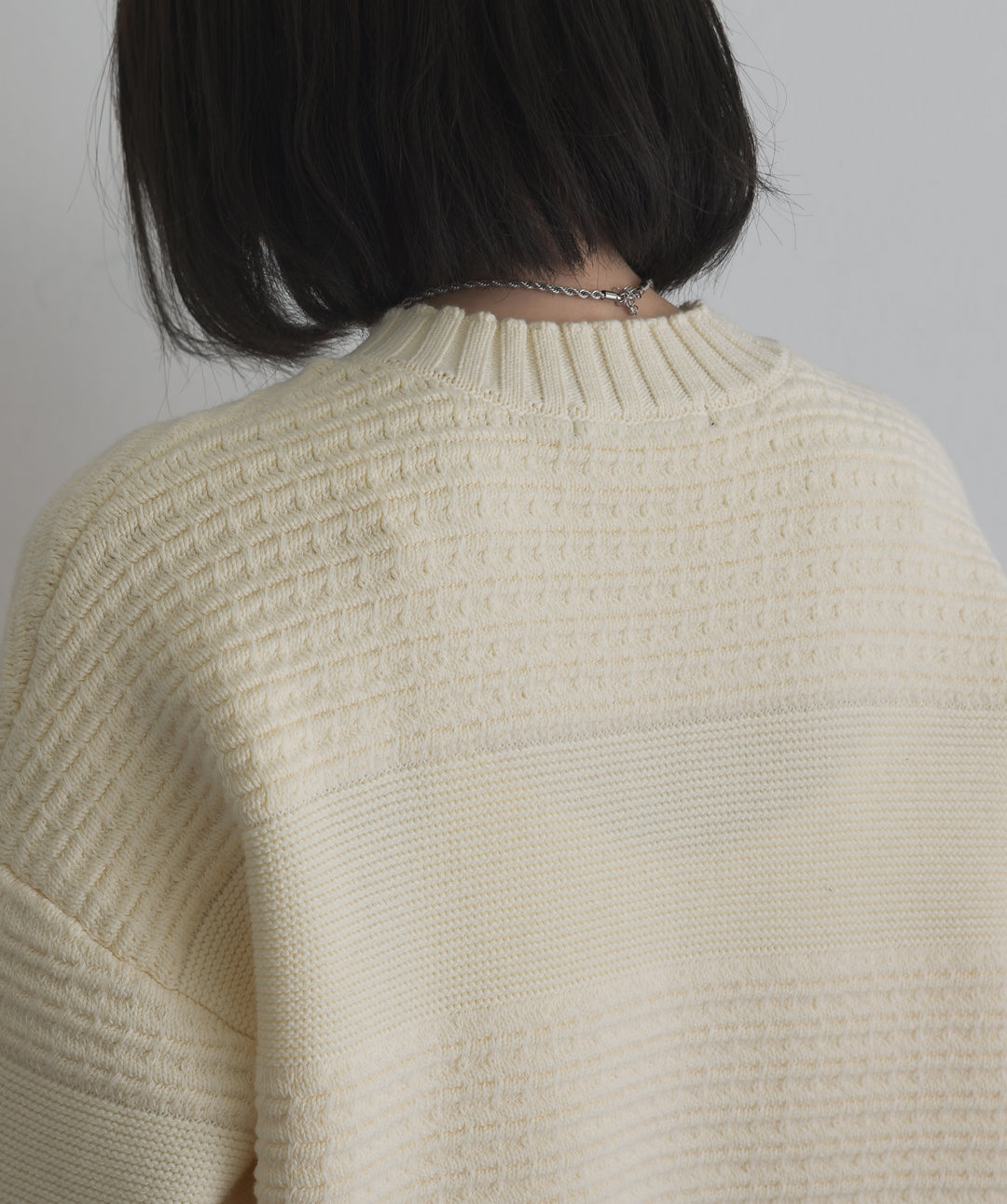 タック編みZIPアップニットカーディガン