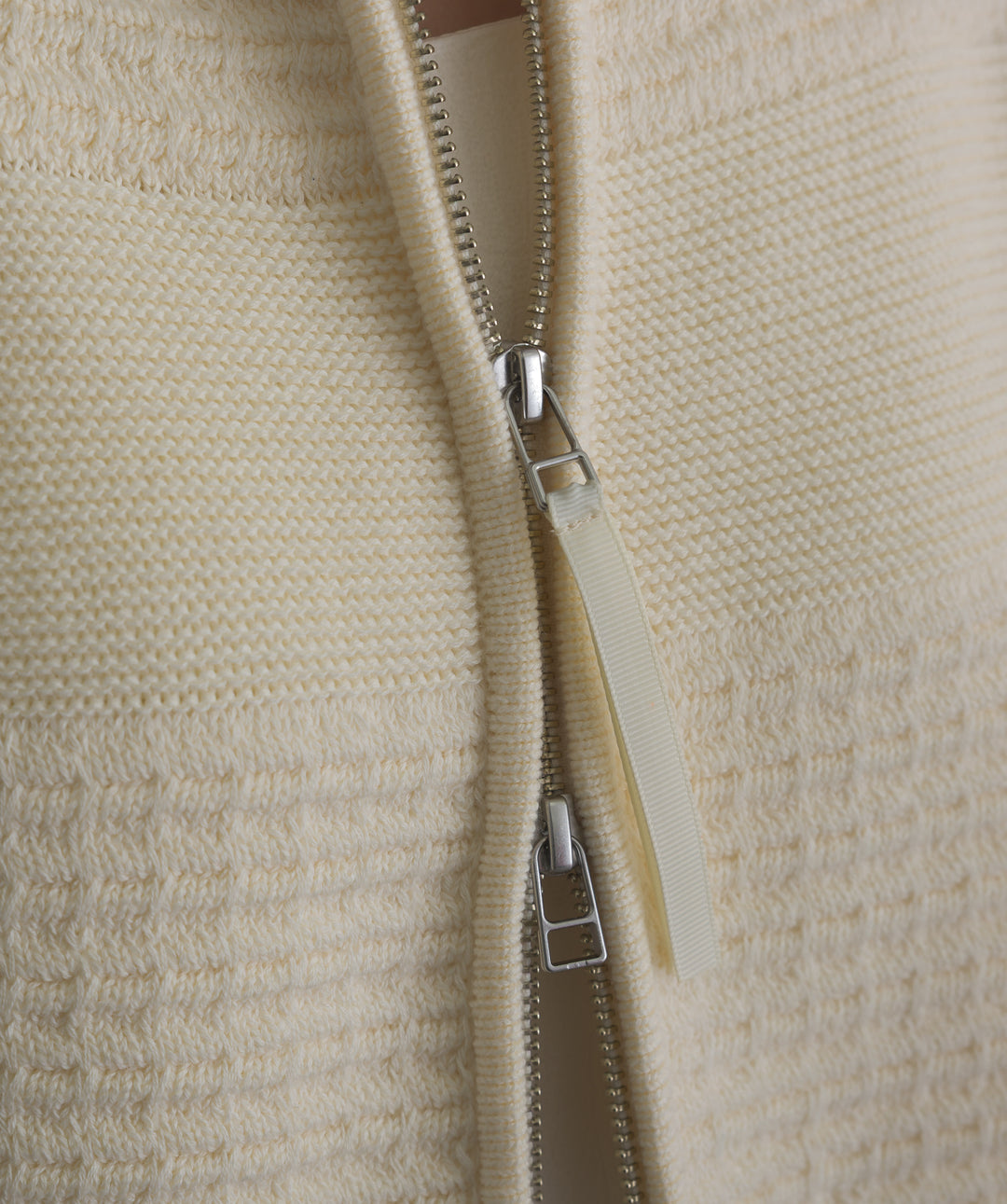 タック編みZIPアップニットカーディガン