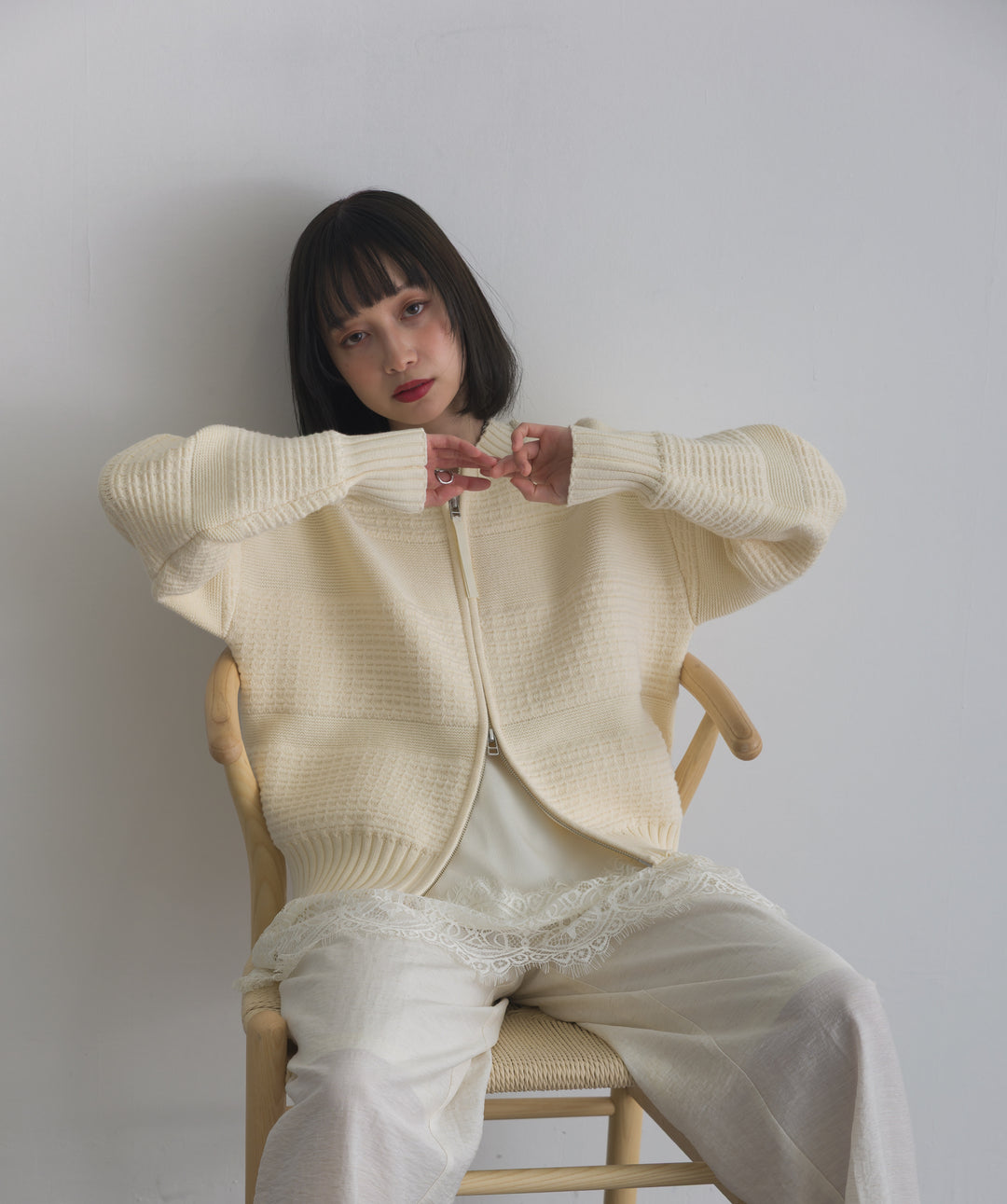 タック編みZIPアップニットカーディガン