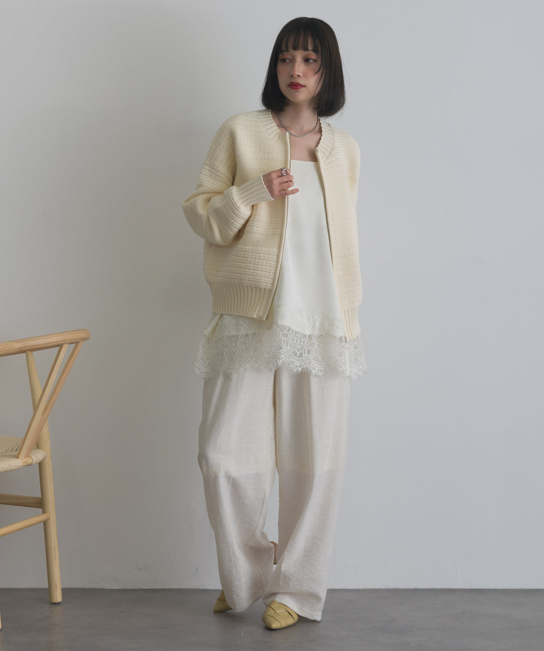 タック編みZIPアップニットカーディガン