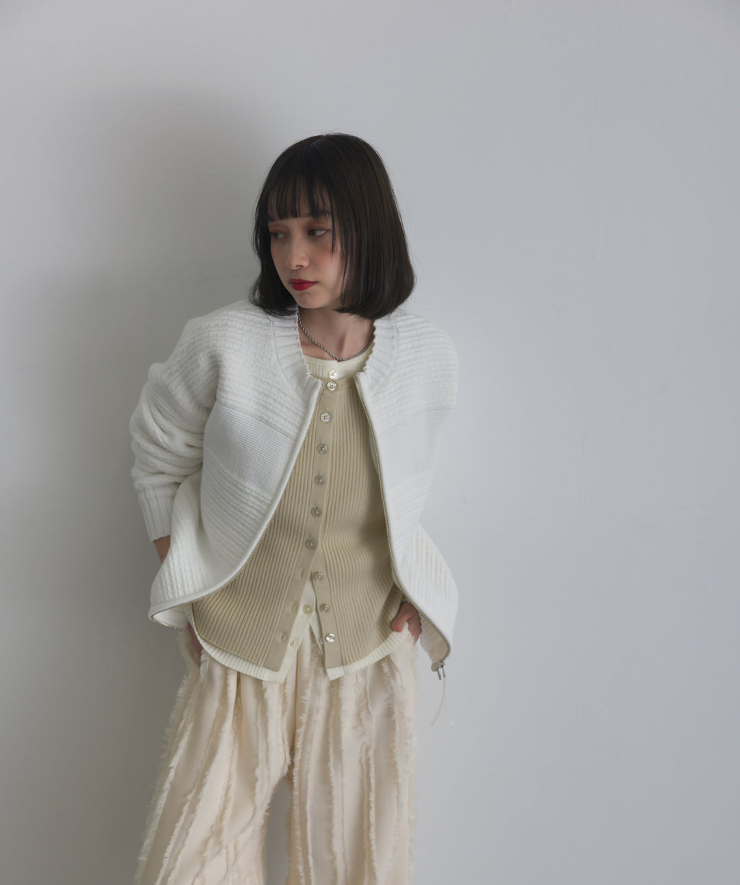 タック編みZIPアップニットカーディガン