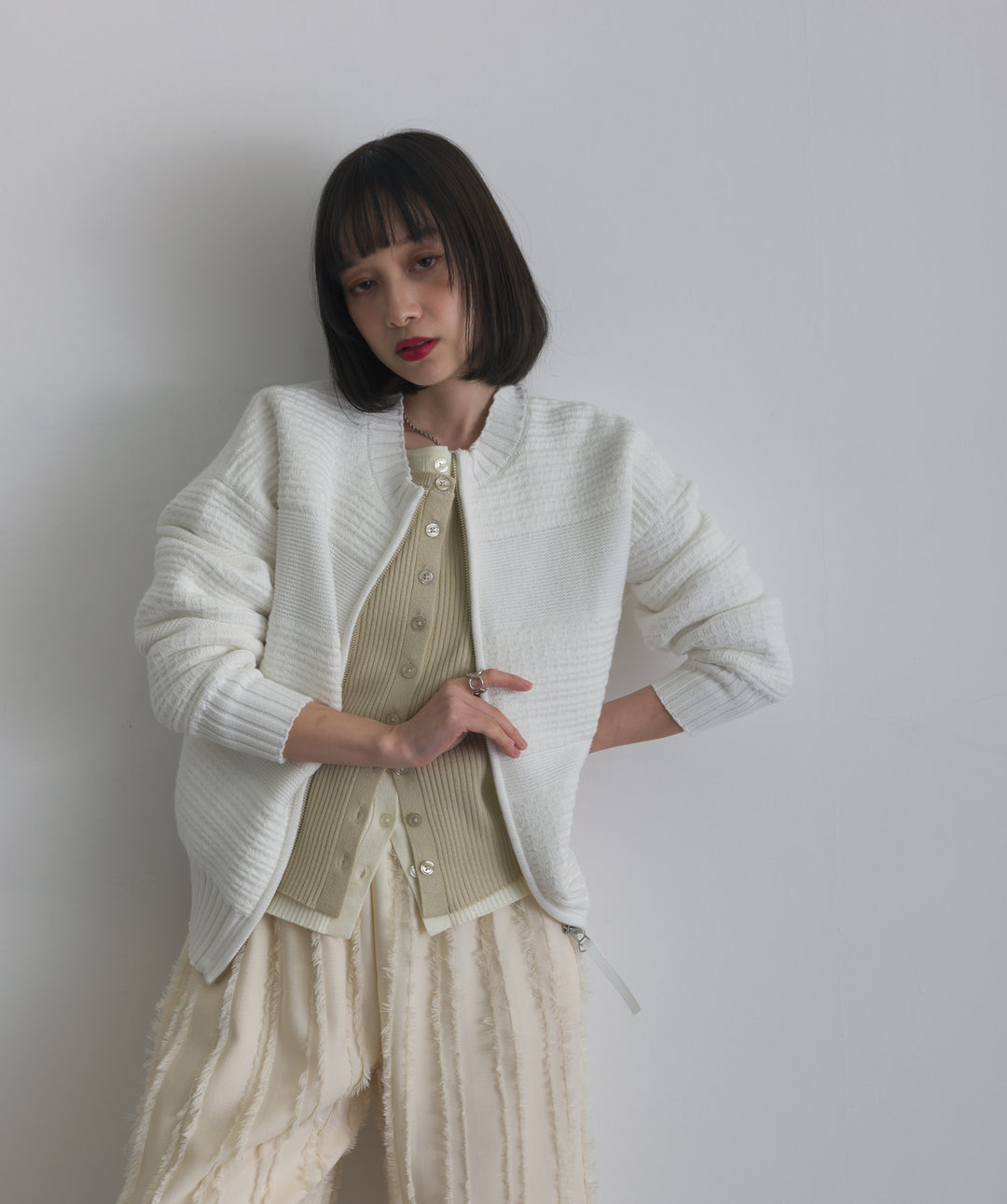 タック編みZIPアップニットカーディガン