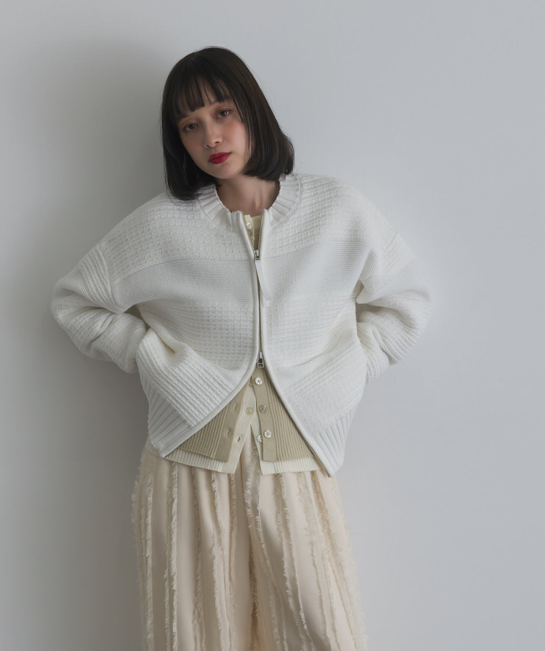 タック編みZIPアップニットカーディガン