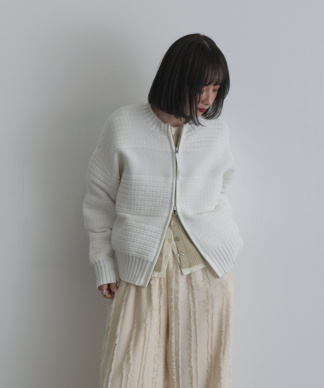 タック編みZIPアップニットカーディガン