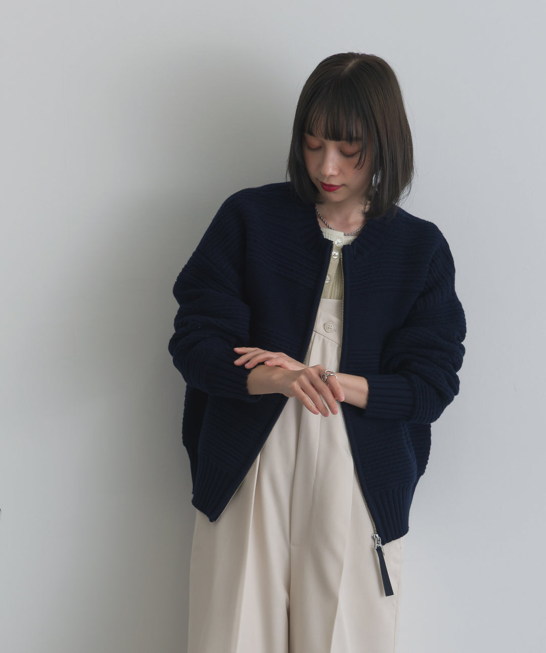 タック編みZIPアップニットカーディガン