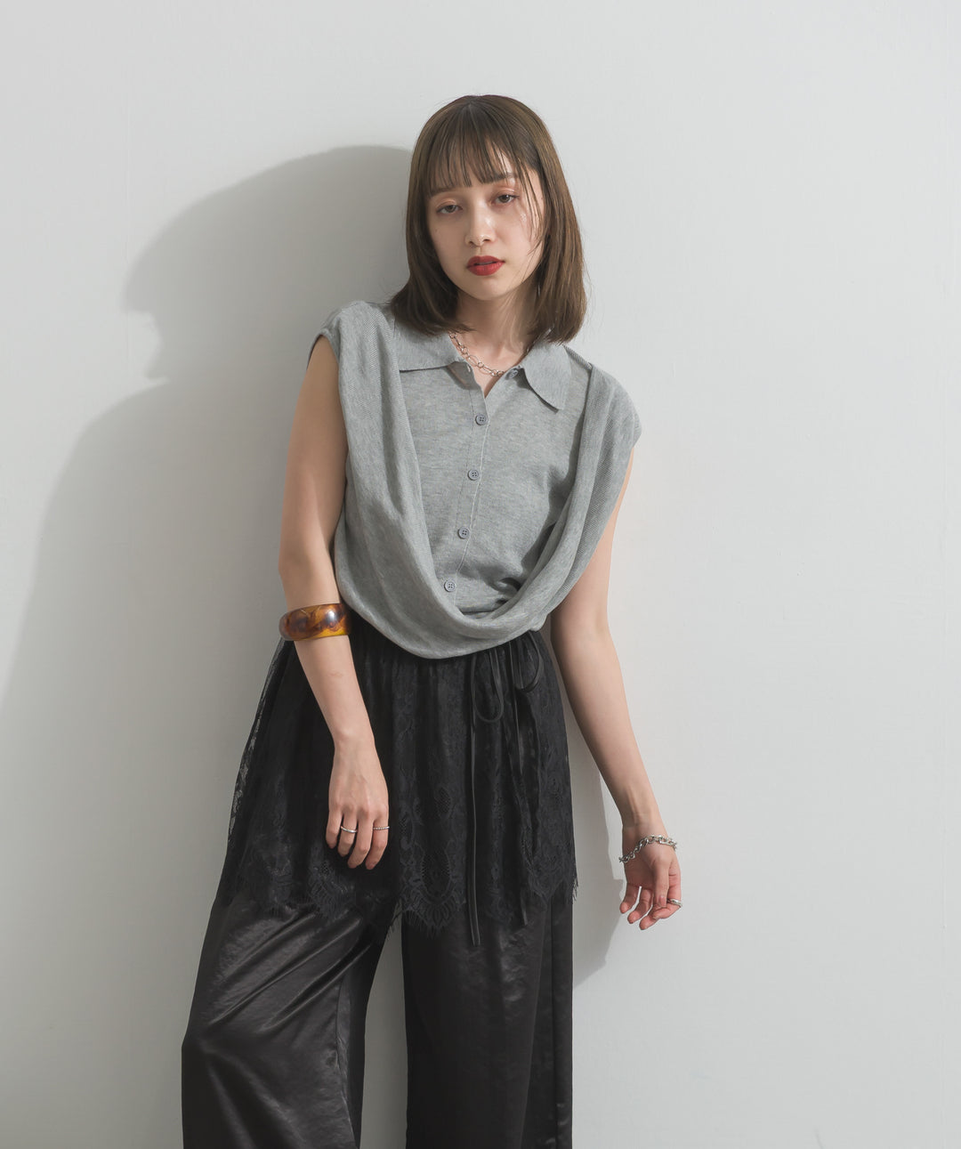 ドレープデザインポロトップス